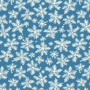 White Snowflakes on Blue Background