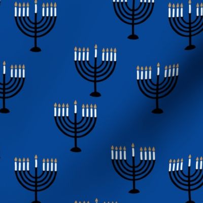 Happy Hanukkah - Jewish nine-branched candelabrum menorah candle white yellow black on eclectic blue