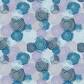 Abstract spinning polka dots in cool winter blue tones