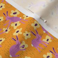 Rabbits (yellow) 12" - Purple rabbits playing amongst the flowers in this folk style bunny and daisy design.  Also available in my tea towel collection and other colorways.