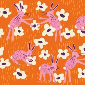 rabbits (orange) 24" - Pink rabbits playing amongst the flowers in this folk style bunny and daisy design.  Also available in my tea towel collection and in other colorways.