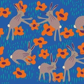 Rabbits (blue) 24" - Yellow rabbits playing amongst the flowers in this folk style bunny and daisy design.  Also available in my tea towel collection and in other colorways.