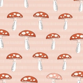 Red mushrooms wallpaper on pink, large scale