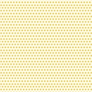 Yellow polka dots on off-white background