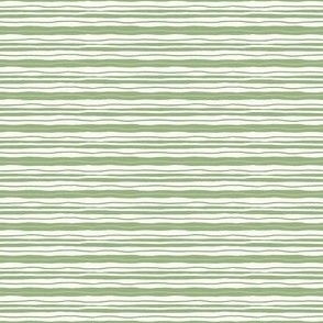 Green stripes on off-white background