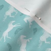 White Horses and feathers on mint turqoise background