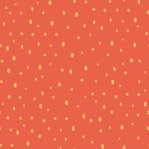 Golden dots on red background