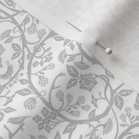 White and grey cut paper botany print - , floral vines, birds and berries.