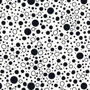 Charcoal gray polka dots on off-white background