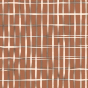 Simple white grid on brown, large scale