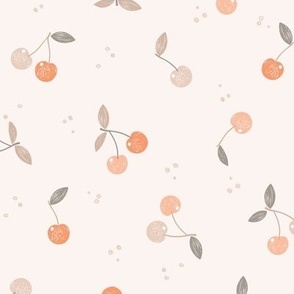 Medium | Tossed Warm orange peach and coral pink cherries on light pink