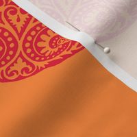 Winged medallion in tangerine orange and red