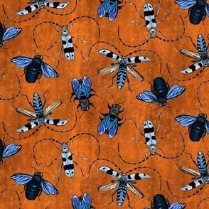 flying creeping crawling - bees and beetles on copper background