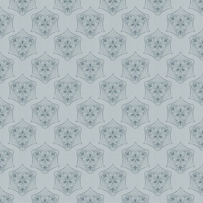 Seed pod hexagons in steel grey on a light grey colored background with a vintage linen texture