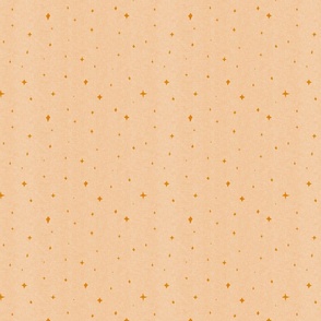 Sparkling stars in mustard on a marble cream background with a linen texture