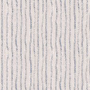 Hand drawn organic stripe in navy on a cream background with a vintage linen texture