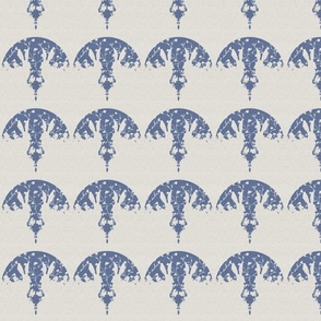 A dusty blue scallop design with hare and floral silhouette design​ on a cream background