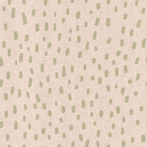 Hand drawn dots and marks in light green on cream coloured background with a vintage linen texture