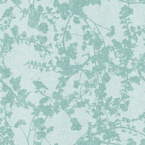 Silhouettes of hedgerow plants​ and​ little birds hidden in the undergrowth​,​ in blue green on light blue linen texture