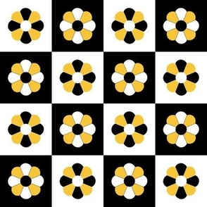 Retro checkered squares with abstract daisies flowers on a black and white plaid seventies yellow 