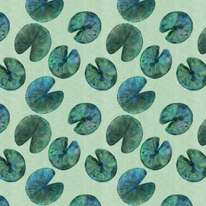 Malachite green lily pads on light green background with linen texture