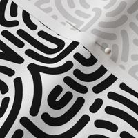 Funky African Maze - retro groovy swirls and circles black on ivory
