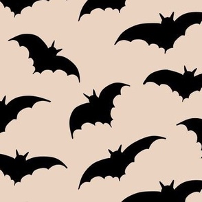 Cute Halloween Bats on a Apricot Orange Background