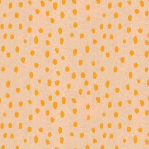Small scale mustard drops on a tan background with vintage linen texture