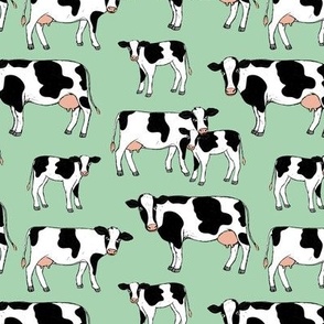 On the farm - cows in black and white spring meadow ink sketched animals American cattle ranch design on mint jade green