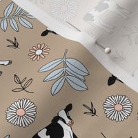 Cute cows in flower fields - spring farmland western cattle farm meadow animals blossom and leaves colorful kids design peach blue gray on latte beige