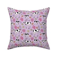 Cute cows in flower fields - spring farmland western cattle farm meadow animals blossom and leaves colorful kids design orange lilac on pink