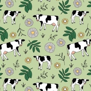 Cute cows in flower fields - spring farmland western cattle farm meadow animals blossom and leaves colorful kids design mint green pine yellow