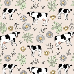 Cute cows in flower fields - spring farmland western cattle farm meadow animals blossom and leaves colorful kids design mint green yellow on beige sand