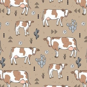 On the ranch - brown and white farm animals western cows spring meadow ink sketched cattle in cacti fields with grass and flowers boho beige sand blue neutral