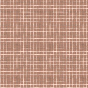 Notebook grid, white lines on clay brown
