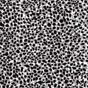 Abstract dot pattern. White and Black dots on the gray background