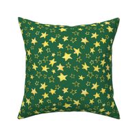 Holiday christmas watercolor yellow stars over emerald green background