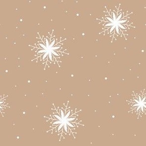 White snowflakes on dark caramel background
