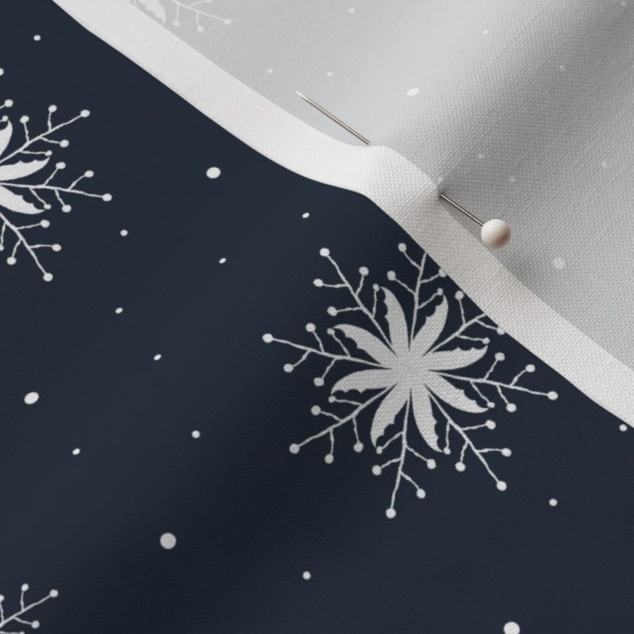 White snowflakes on navy background