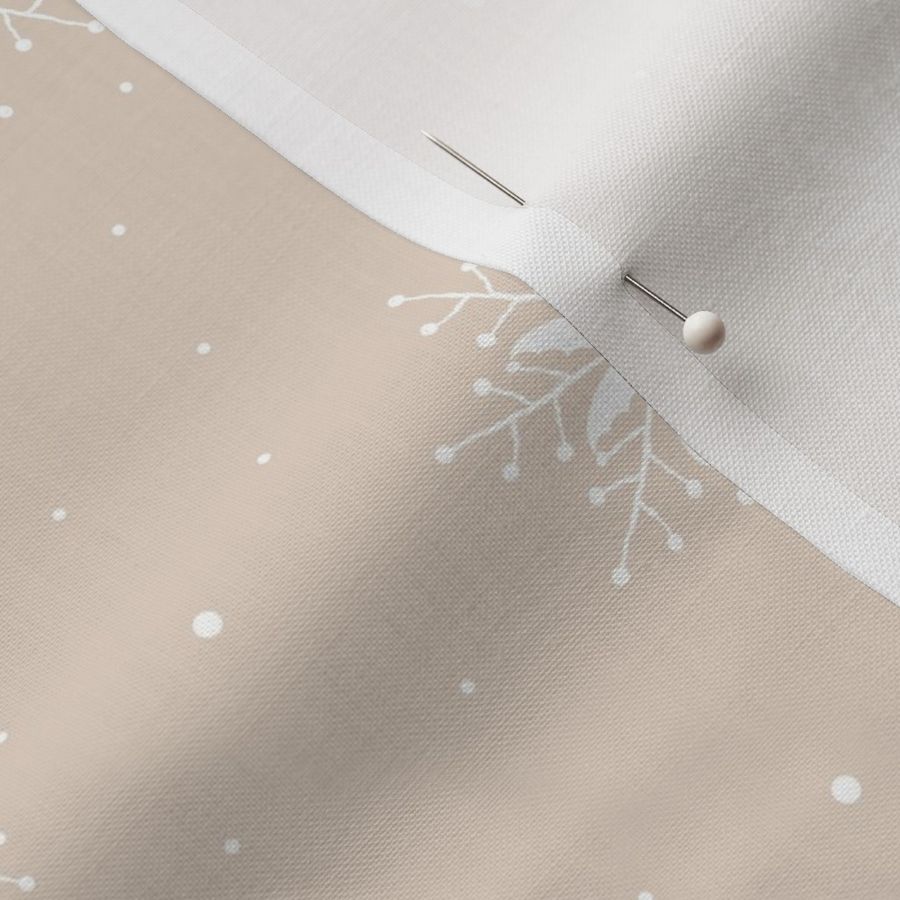 White snowflakes on caramel background