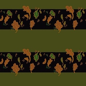 Autumn gold leaf on black and forest green