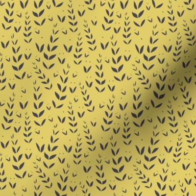 charcoal leaves texture on yellow background