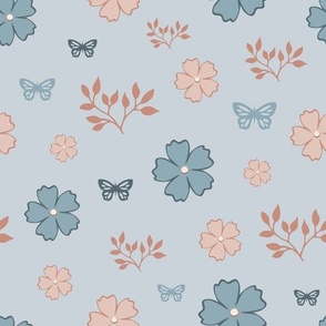 Leaves, flowers and butterflies on blue background