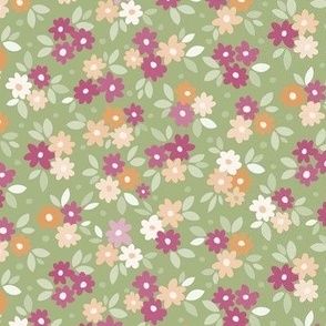 Small  scale simple tossed graphic floral pattern in tones of orange, cream, burgundy, pink and soft minty leaf green,, for children/baby/toddler/nursery soft furnishings and apparel/clothing.