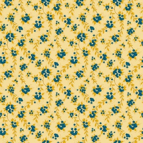 blueberries and goldenrod leaves on yellow background | small