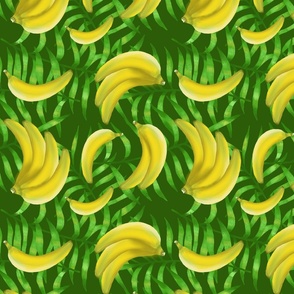 Bunch of ripe bananas on palm leaves  