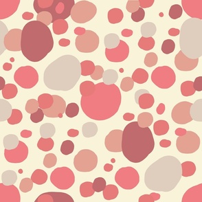 Bubbles in shades of pink on cream background