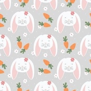 Easter Bunnies and Carrots on Gray Background