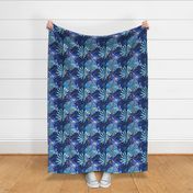 Colorful abstract tropical pattern. Red, blue flowers and leaves on dark blue grunge background.
