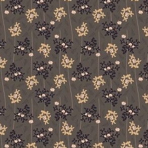 (S) whimsical yellow and taupe flowers in lines with leaves on dark tan